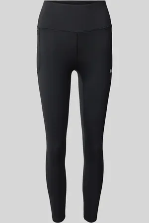 Under Armour Legginsy o kroju skinny fit z nadrukiem z logo model ‘Motion’