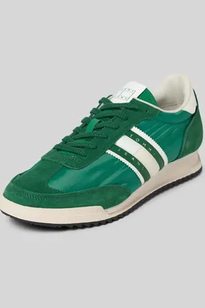 Tommy Hilfiger Sneakersy skórzane z napisem z logo model ‘RETRO RUNNER CLEATED’