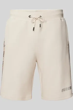 Guess Szorty z dzianiny dresowej o kroju regular fit z nadrukiem z logo model ‘MICKEY’