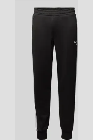 PUMA Spodnie dresowe z nadrukiem z logo