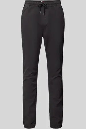 Tommy Hilfiger Spodnie sportowe o kroju tapered fit z tunelem model ‘AUSTIN’