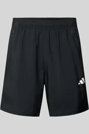 adidas Szorty o kroju regular fit z nadrukiem z logo
