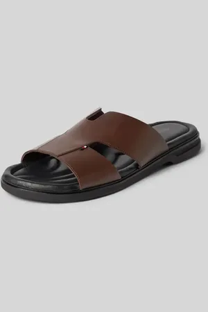 Tommy Hilfiger Kapcie ze skóry z wycięciem na pasku