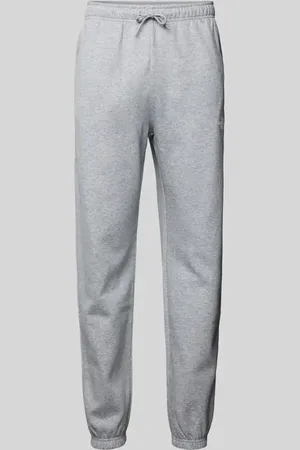 The North Face Spodnie dresowe o kroju regular tapered fit z nadrukiem z logo