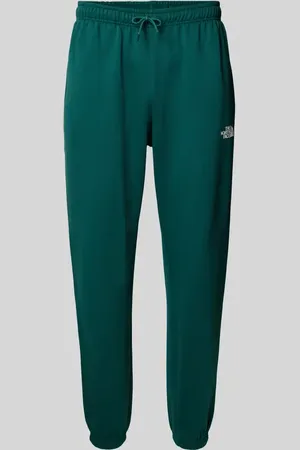 The North Face Spodnie dresowe o kroju regular tapered fit z nadrukiem z logo