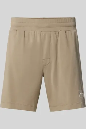 HUGO BOSS Szorty z dzianiny dresowej o kroju regular fit z nadrukiem z logo model ‘Laze’