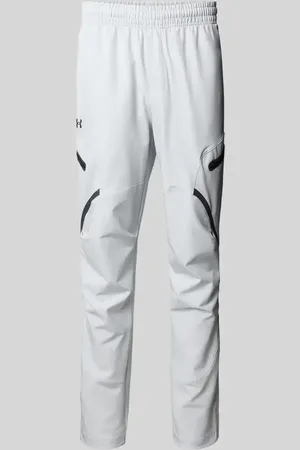 Under Armour Spodnie treningowe o kroju relaxed fit z kieszeniami cargo model ‘Unstoppable’