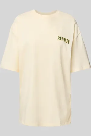Review T-shirt o kroju oversized z nadrukiem z logo