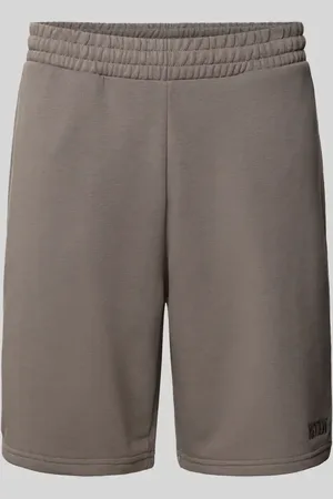 Review Szorty z dzianiny dresowej o kroju relaxed fit z wyhaftowanym logo