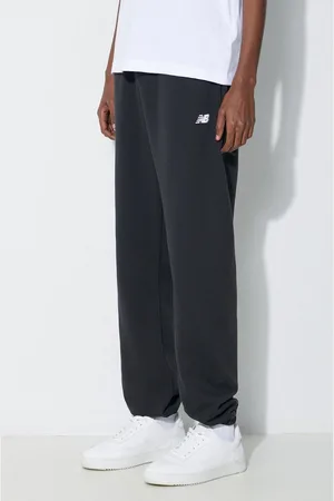 New Balance Spodnie dresowe Essentials French Terry Jogger kolor gładkie MP41519BK