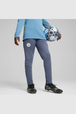 PUMA Młodzieżowe spodnie treningowe Manchester City