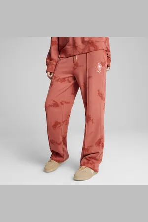PUMA Damskie proste spodnie dresowe WARDROBE ESS FLORAL PACK z efektem sprania