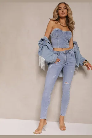 Renee Jasnoniebieskie Jeansy z Bawełny Typu Skinny High Waist Ozdobione Przetarciami Nelliova