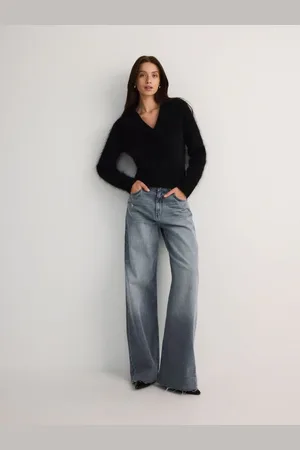 Reserved Jeansy wide leg z przetarciami