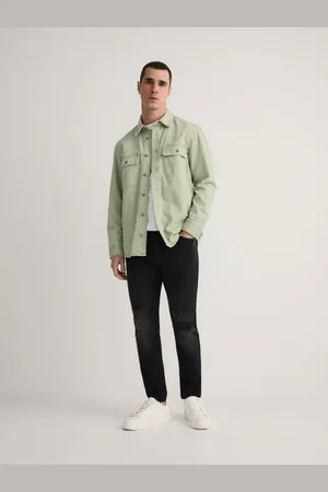 Reserved Jeansy carrot slim z przetarciami