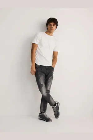 Reserved Jeansy carrot slim z przetarciami