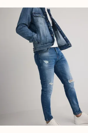 Reserved Jeansy carrot slim z przetarciami