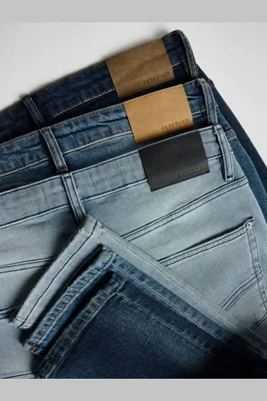 Reserved Jeansy slim z efektem sprania