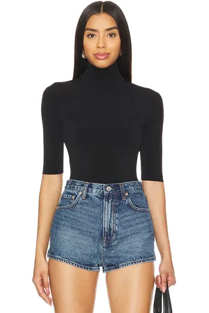 Norma Kamali Slim Fit Short Sleeve Turtleneck Top