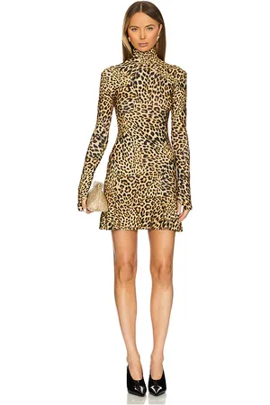 Norma Kamali Long Sleeve Turtleneck Fishtail Mini Dress