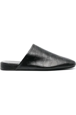 Balenciaga Buty, Mężczyzna, Czarny, 40 EU, Len, Czarne Skórzane Mule z Wytłoczonym Logo
