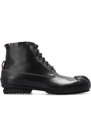 Maison Margiela Buty, Mężczyzna, Czarny, 42 EU, Czarne Skórzane Trampki z Detalem Logo