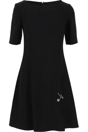 VERSACE Sukienki, Kobieta, Czarny, S, Sukienka Mini z detalami broszki