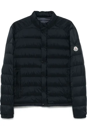 Moncler Kurtki, Mężczyzna, Niebieski, L, Niebieski pikowany płaszcz z naszywką