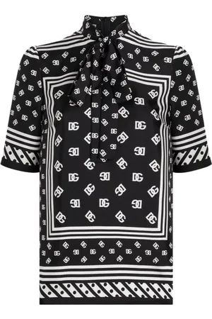 Dolce & Gabbana Bluzki, Kobieta, Czarny, S, Koszula z krótkim rękawem z logo i kokardą
