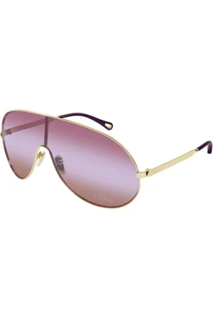 Chloé Akcesoria, unisex, Żółty, L, Złote okulary przeciwsłoneczne w stylu maski