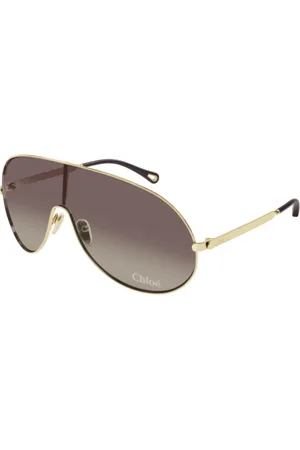 Chloé Akcesoria, unisex, Żółty, L, Złote okulary przeciwsłoneczne w stylu maski