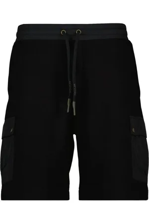 Moncler Szorty, Mężczyzna, Czarny, M, Bawełna, Rozkloszowane szorty z naszywką logo