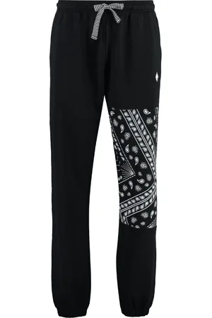 MARCELO BURLON Spodnie, Mężczyzna, Czarny, S, Bawełna, Spodnie dresowe z kontrastującym nadrukiem
