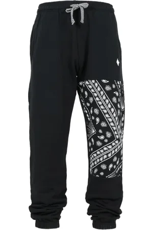MARCELO BURLON Spodnie, Mężczyzna, Czarny, M, Bawełna, Sportowe spodnie dresowe z bawełny z nadrukiem bandany