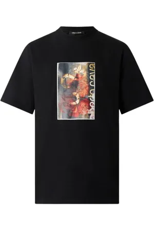 Roberto Cavalli Koszulki, Mężczyzna, Czarny, M, Bawełna, T-shirt z efektem znoszenia z nadrukiem węża i róży