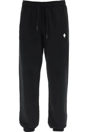 MARCELO BURLON Spodnie, Mężczyzna, Czarny, L, Bawełna, Spodnie dresowe z logo Cross