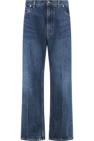 Dolce & Gabbana Jeansy, Mężczyzna, Niebieski, M, Jeansyy z szerokimi nogawkami i haftem z tyłu