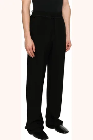 ANN DEMEULEMEESTER Spodnie, Mężczyzna, Czarny, M, Czarne spodnie z guzikami i kieszeniami