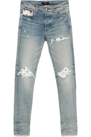 AMIRI Jeansy, Mężczyzna, Niebieski, W30 L34, Jasnoniebieskie Ripped Jeansyy z guzikami