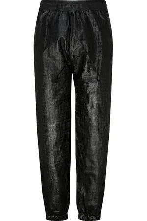 Givenchy Spodnie, Mężczyzna, Czarny, S, Wytłaczane Logo Skórzane Spodnie do Joggingu