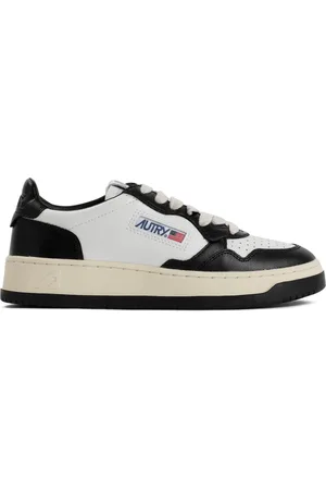 Autry Buty, Kobieta, Czarny, 36 EU, Czarne Skórzane Sneakersy z Wytłaczanymi Szczegółami