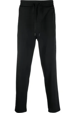 Moncler Spodnie, Mężczyzna, Czarny, M, Poliester, Czarne Joggersy z Nitami Poliester 100%