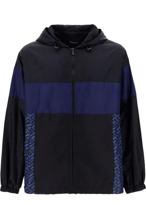 VERSACE Kurtki, Mężczyzna, Niebieski, L, Niebieska Kurtka Wiatrówka z Kapturem Aw 23