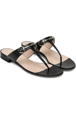 Gucci Buty, Kobieta, Czarny, 36 1/2 EU, Czarne płaskie skórzane sandały z detalami Horsebit
