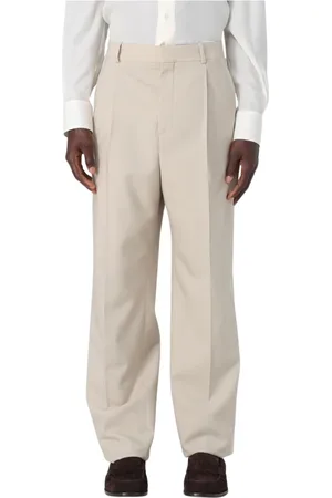 Saint Laurent Spodnie, Mężczyzna, Beżowy, L, Beżowe Plisowane Spodnie Relaxed Fit