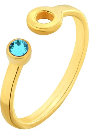 SOTHO Złoty pierścionek z karmą i kryształkiem Blue Zircon SWAROVSKI® CRYSTAL