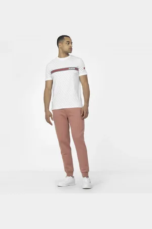 Guess Męskie spodnie dresowe ALDWIN LONG PANT - łososiowe