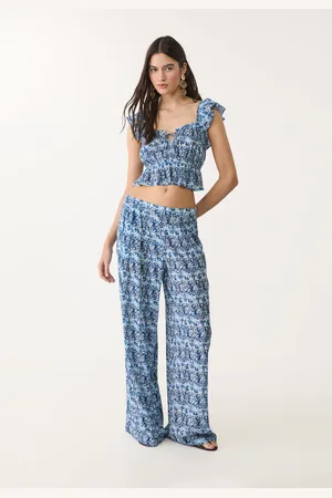 Stradivarius Luźne wzorzyste spodnie palazzo XS