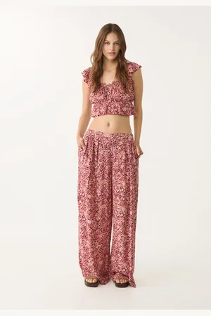 Stradivarius Luźne wzorzyste spodnie palazzo XS