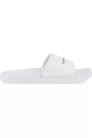 Calvin Klein Klapki Slide Monogram TPU YM0YM00361-YBR
